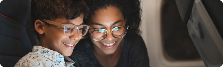 Two people looking at a screen