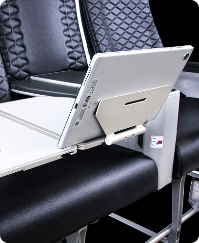 assento da classe econômica com suporte para tablet